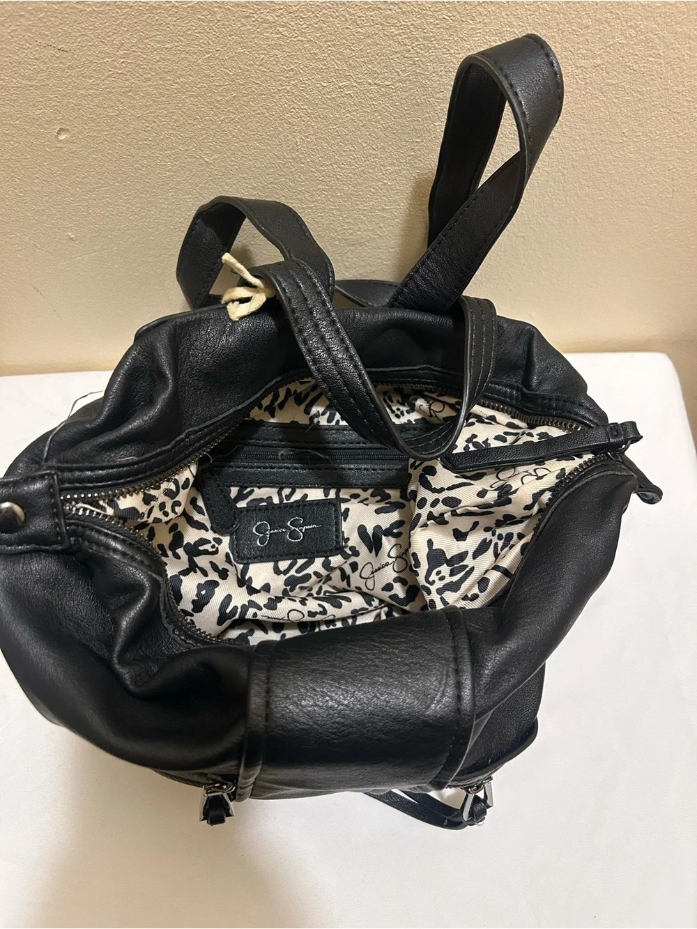 Jessica Simpson Black Leather Backpack with Front Zip Pockets